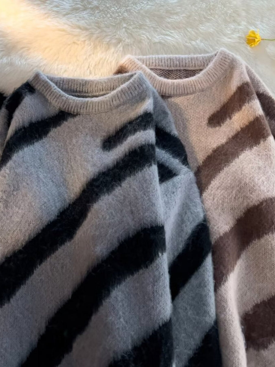 Gray and beige striped fuzzy sweaters with crew necks