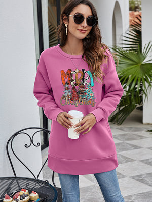 Extended hemline dusty purple sweatshirt with festive Merry Christmas graphic and trees.