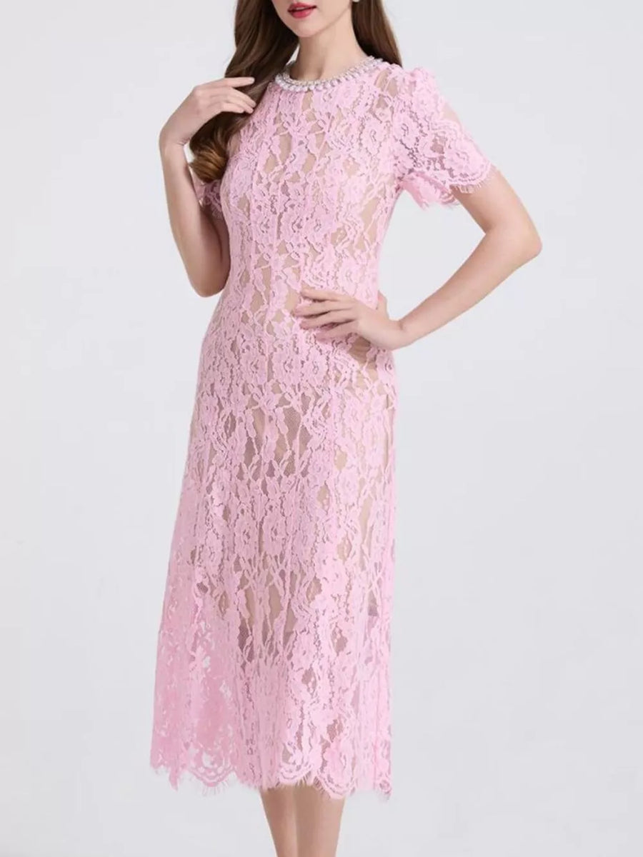 Pink lace midi dress with pearl neckline and short sleeves.