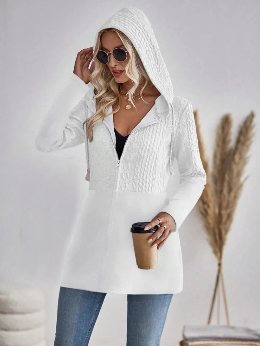 Ivory cable-knit hooded zip jacket with textured detail