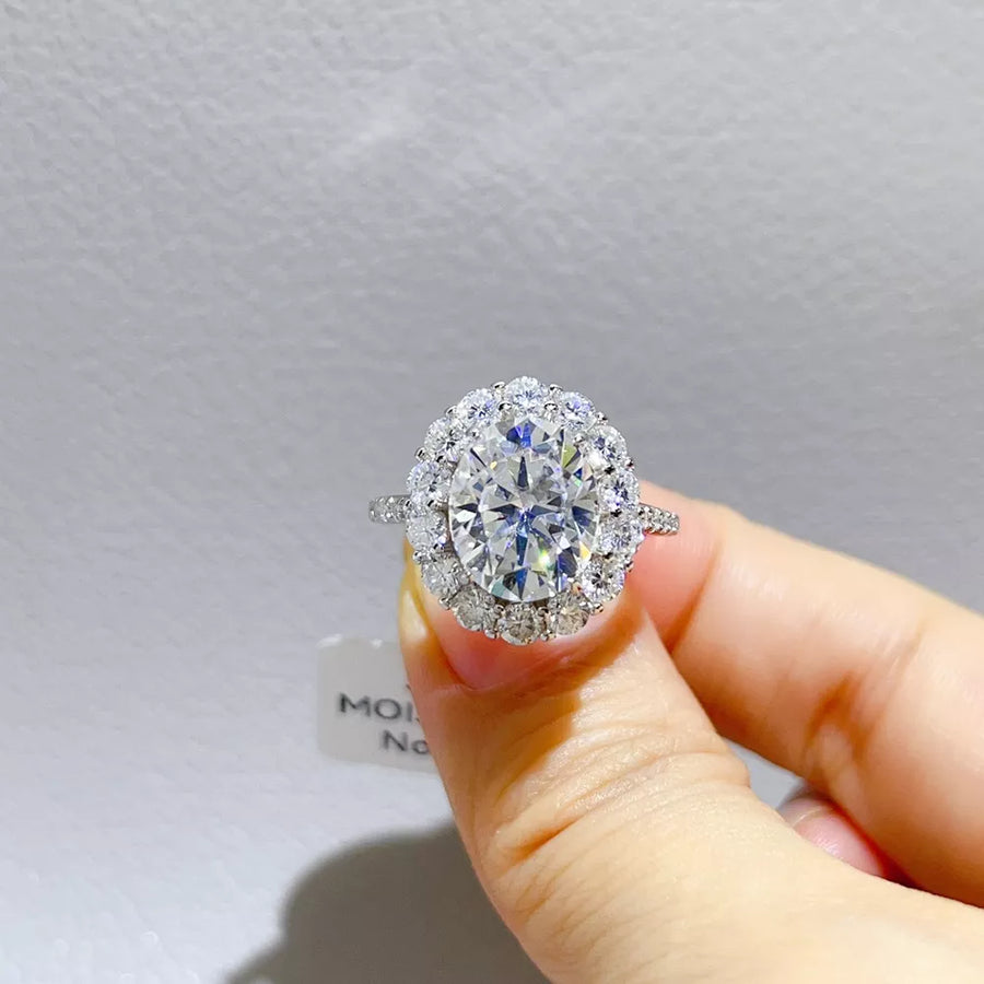 925 sterling silver,Moissanite Carat weight: 5ct Care instructions: Avoid wearin ring in Silver with oval silhouette