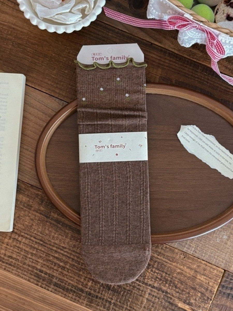 brown socks featuring ribbed knit and ditsy floral