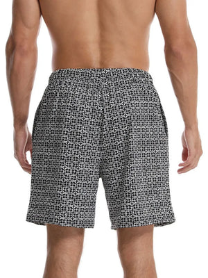 Geometric print boardshorts in black with a white pattern.