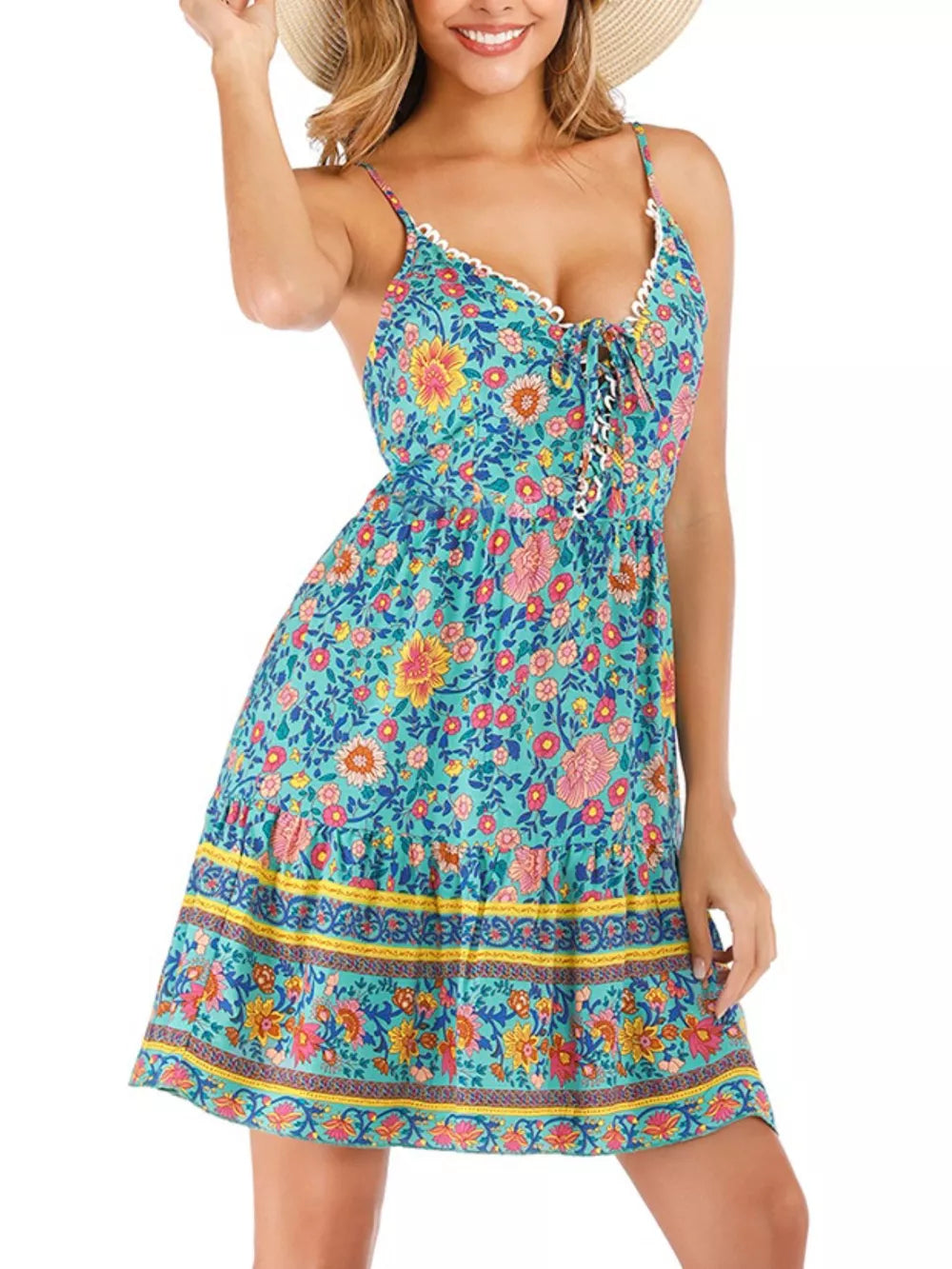 Vibrant floral mini dress with lace-up detail, tiered hem, and yellow trim.