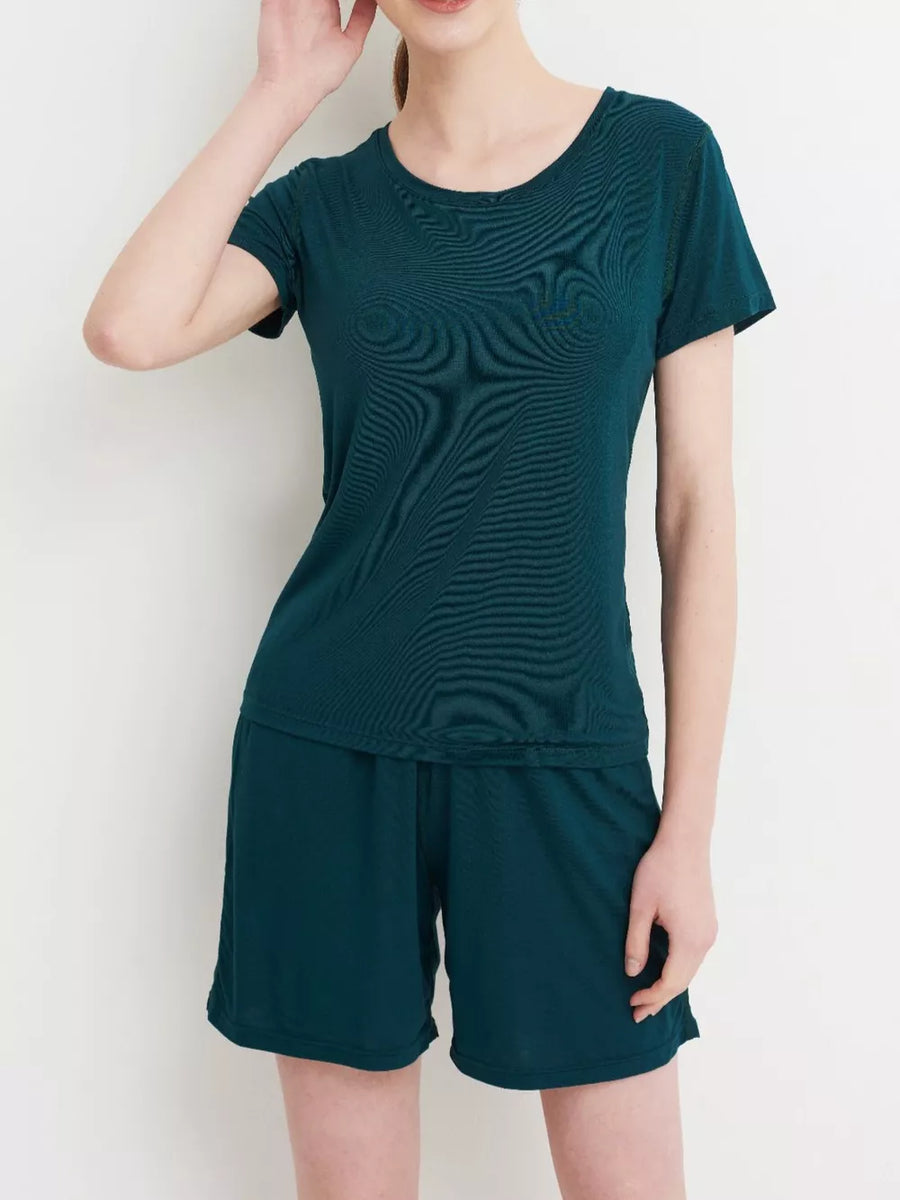 Fini Green short sleeve pajama set with crew neck top and elastic waist shorts.