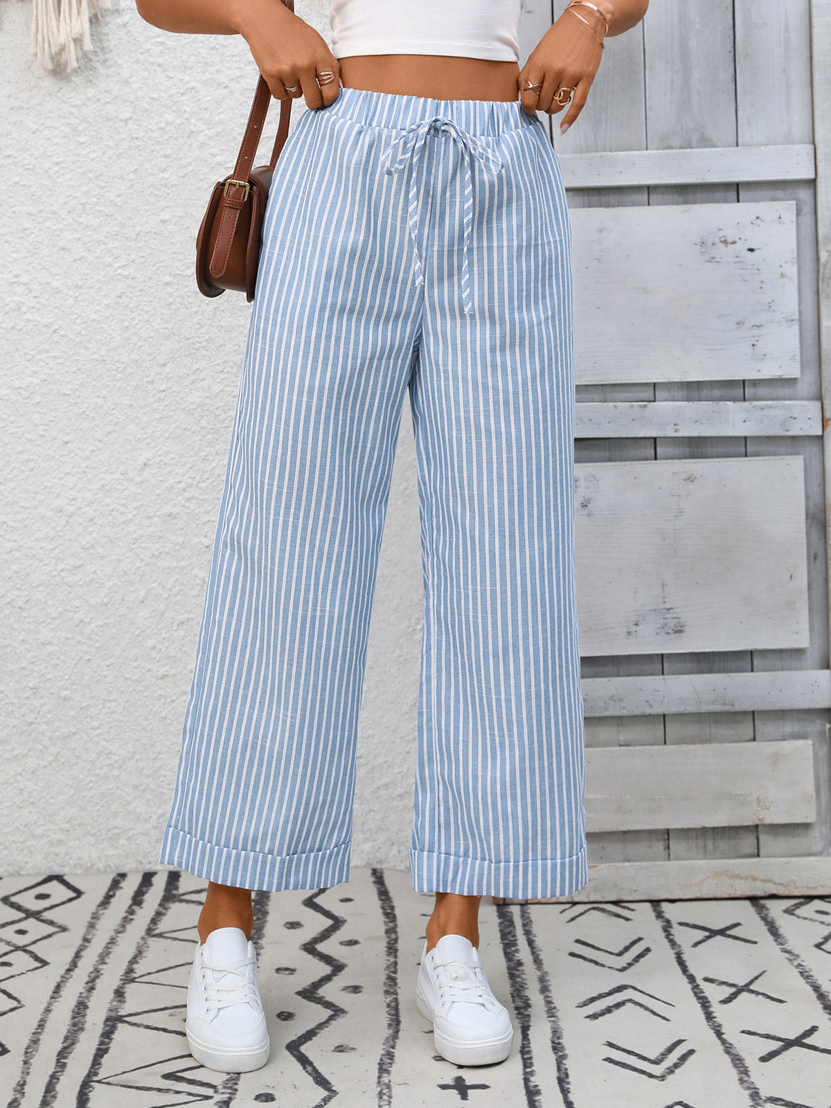 Light blue and white striped drawstring wide leg pants with pockets