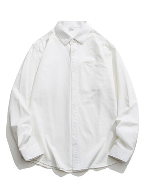 White cotton button-down shirt with long sleeves and a chest pocket.