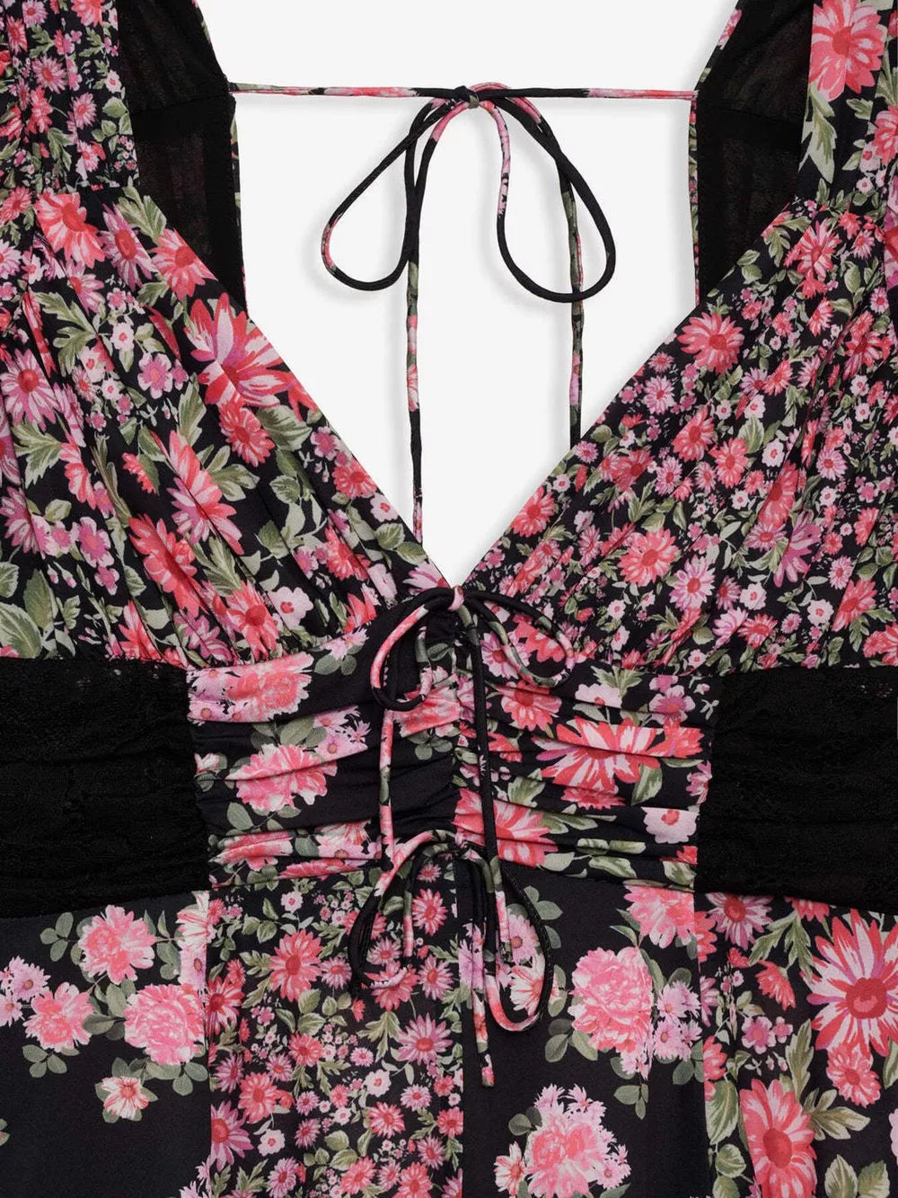 Ruched floral tie-front dress with black lace detail and V-neck.