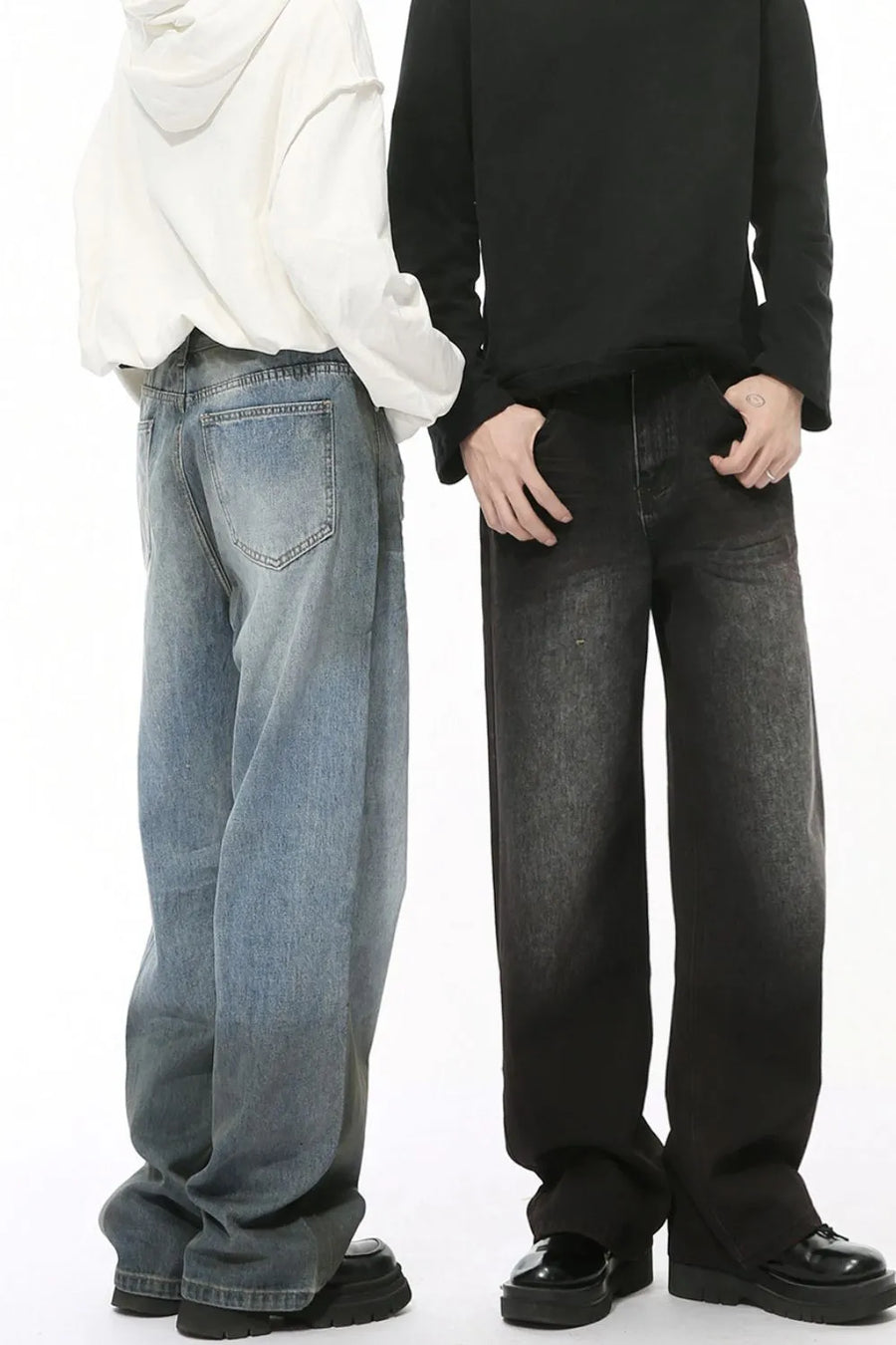 Pocketed high rise slouchy denim jeans in medium and dark washes.