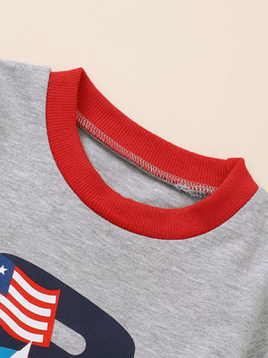 Baby set with patriotic truck graphic, gray long sleeve top with red trim and American flag detail.
