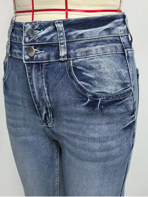 Classic high-waisted flare jeans in blue denim with double button closure and distressed wash.