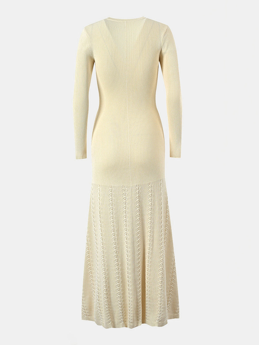 Pastel yellow ribbed knit maxi dress with decorative button detail and patterned skirt.
