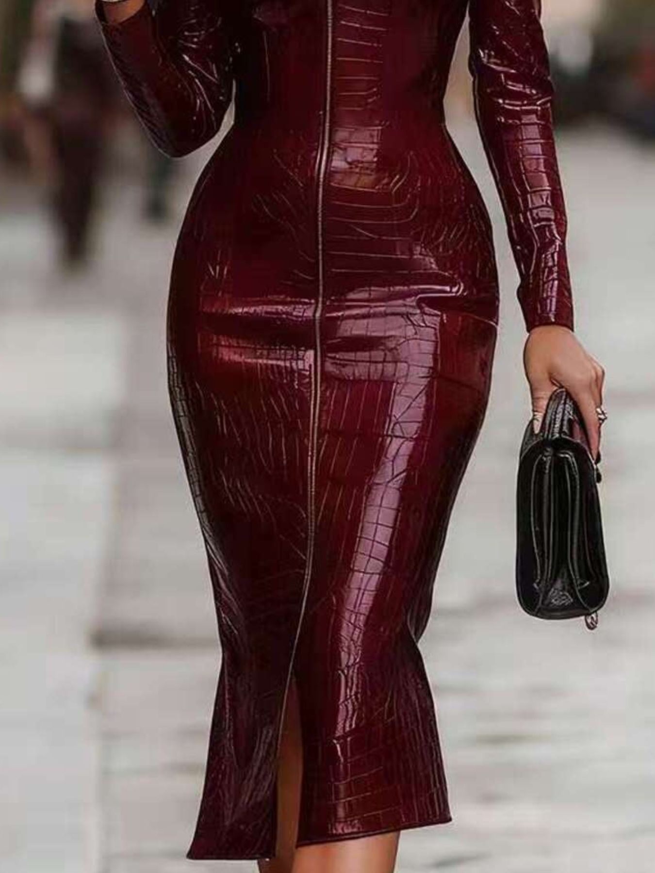 Burgundy crocodile-embossed bodycon midi dress with a front zipper and side slit.