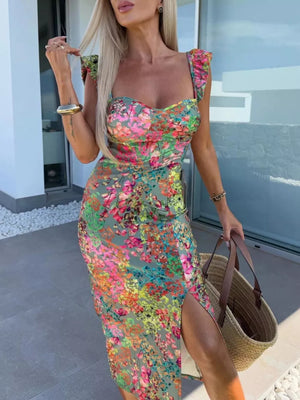 Floral sweetheart midi dress with ruffle sleeves and a high slit.
