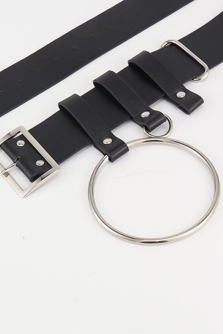 Black leather belt with silver buckle and large ring detail