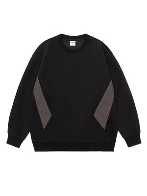Black oversized cotton crew-neck sweatshirt with dark gray panel details.