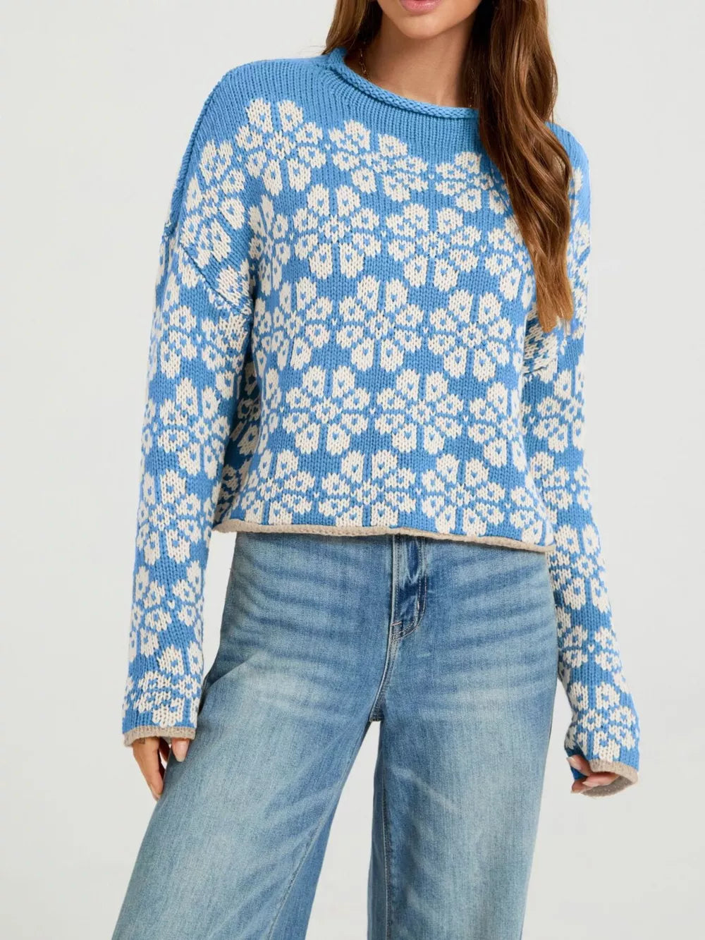 100% Acrylic Care instructions: Machine wash cold pullover sweater in Blue with relaxed silhouette