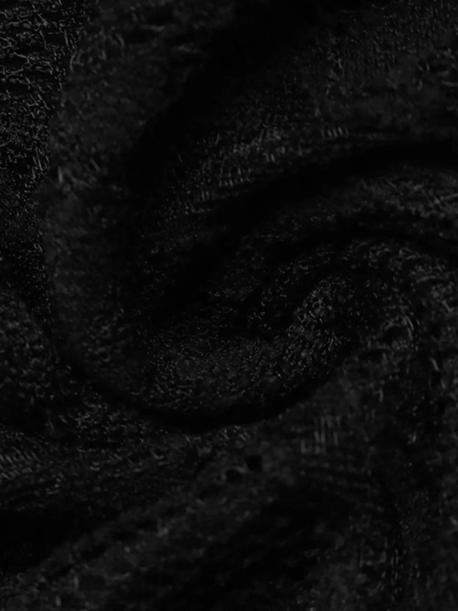 Black textured knit fabric