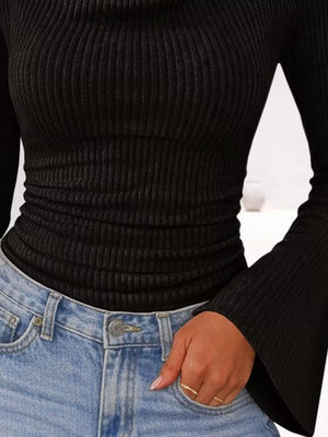 100% polyester Care instructions: Machine wash cold pullover sweater in Purple Red with fitted silhouette