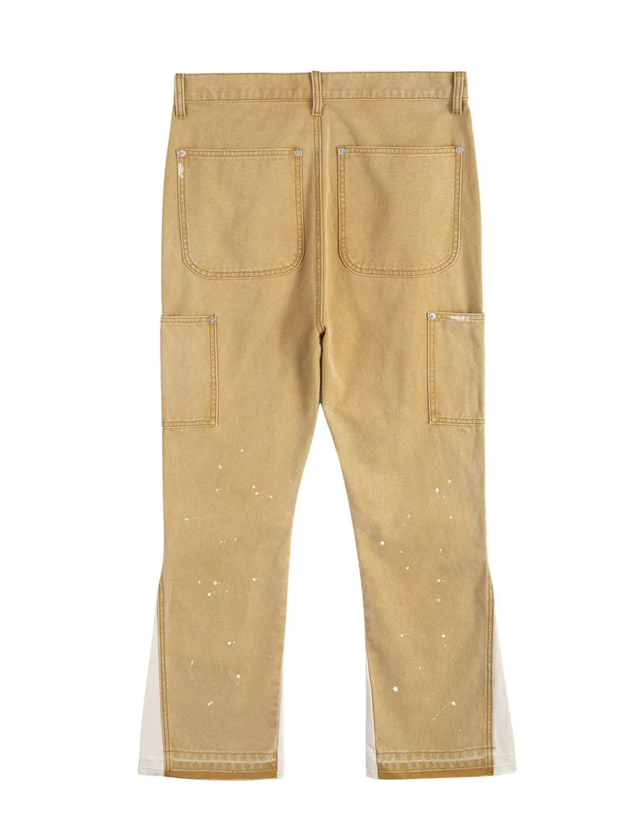 Split panel bootcut jeans in coffee brown with white paint splatters and side panels.