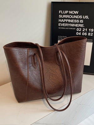 Premium crinkled pu leather tote bag in coffee brown with dual shoulder straps.