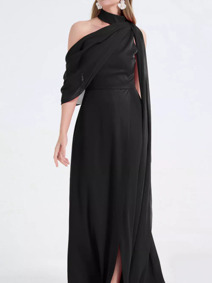 Black asymmetrical maxi dress with high slit and draped neckline.