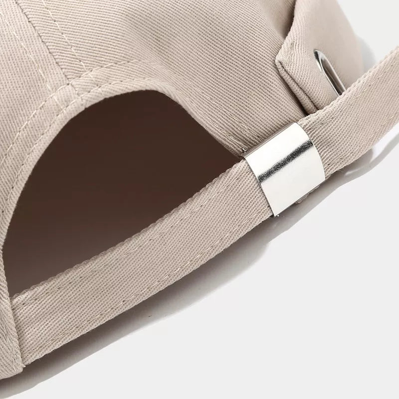 beige hat with adjustable strap and N/A