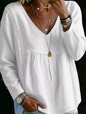 blouse in ivory featuring lace trimmed and relaxed fit