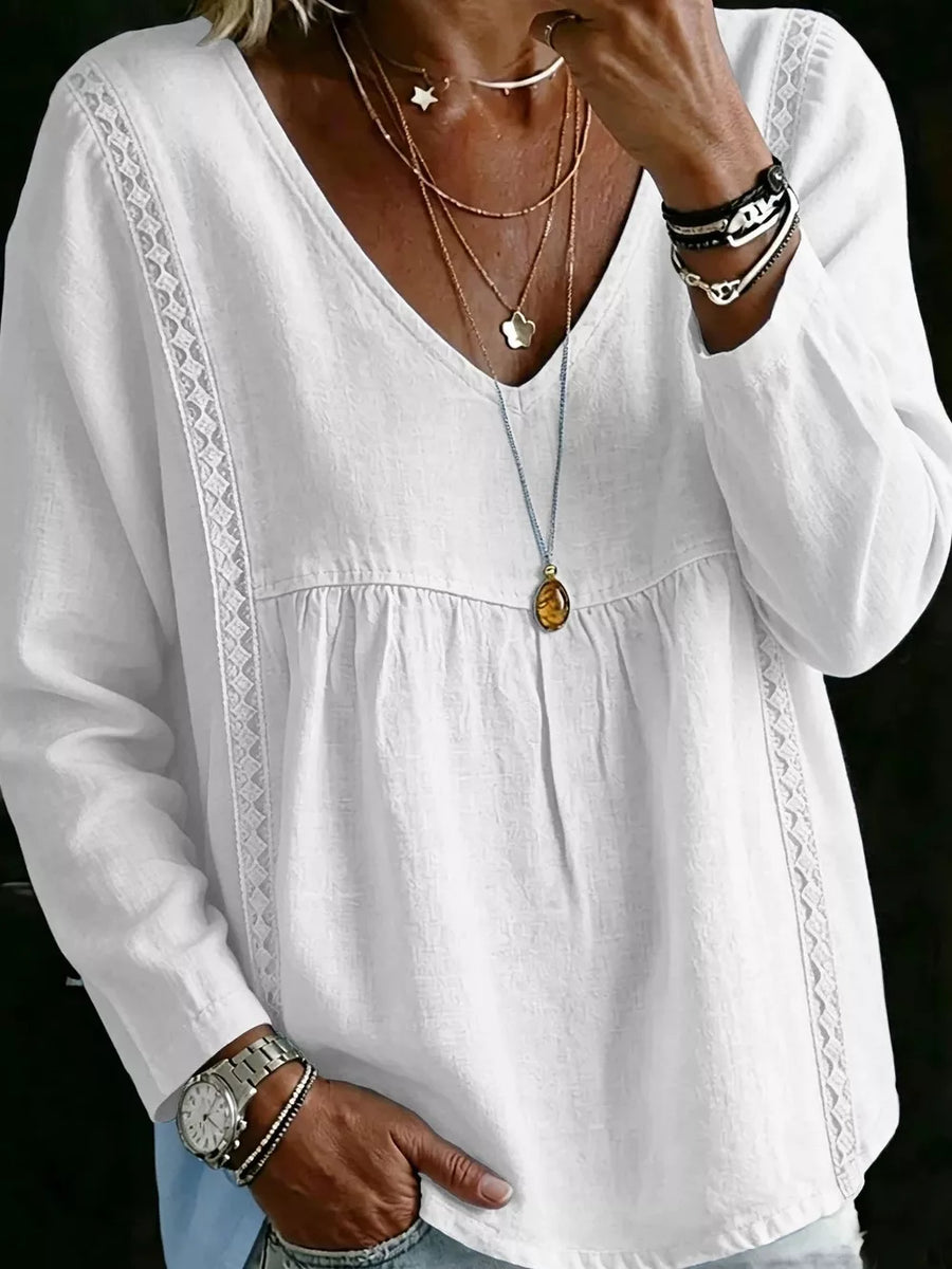 blouse in ivory featuring lace trimmed and relaxed fit