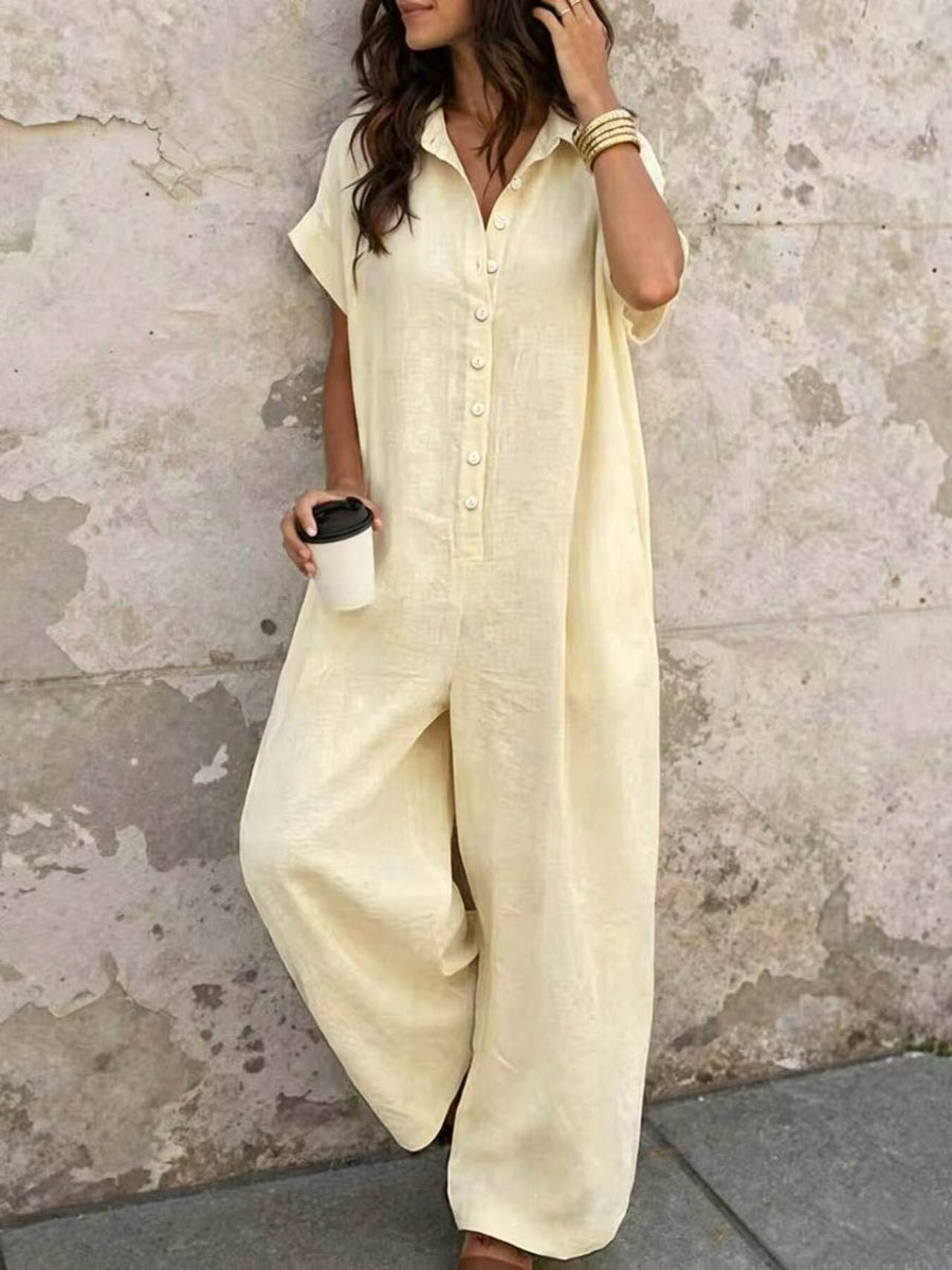 White jumpsuit with button-front and short sleeve
