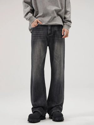 Men's black wide-leg vintage wash denim jeans with a comfortable fit.