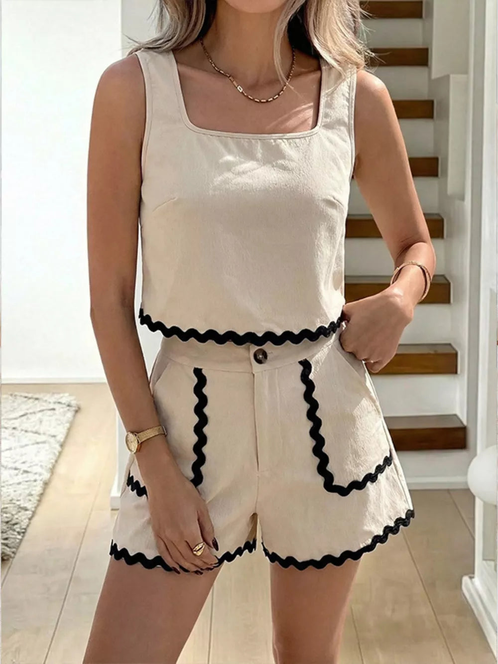 Scalloped trim tank and shorts set in beige with black trim, square neckline, and button closure.