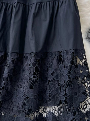 Black tiered skirt with elastic waist and floral lace hem detail