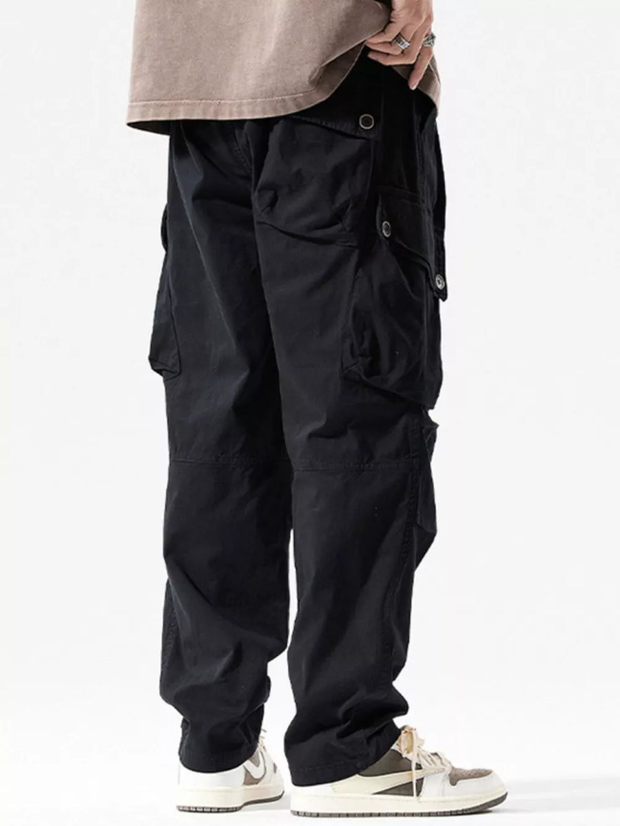 Men's black loose fit cargo sweatpants with multiple pockets and drawstring.