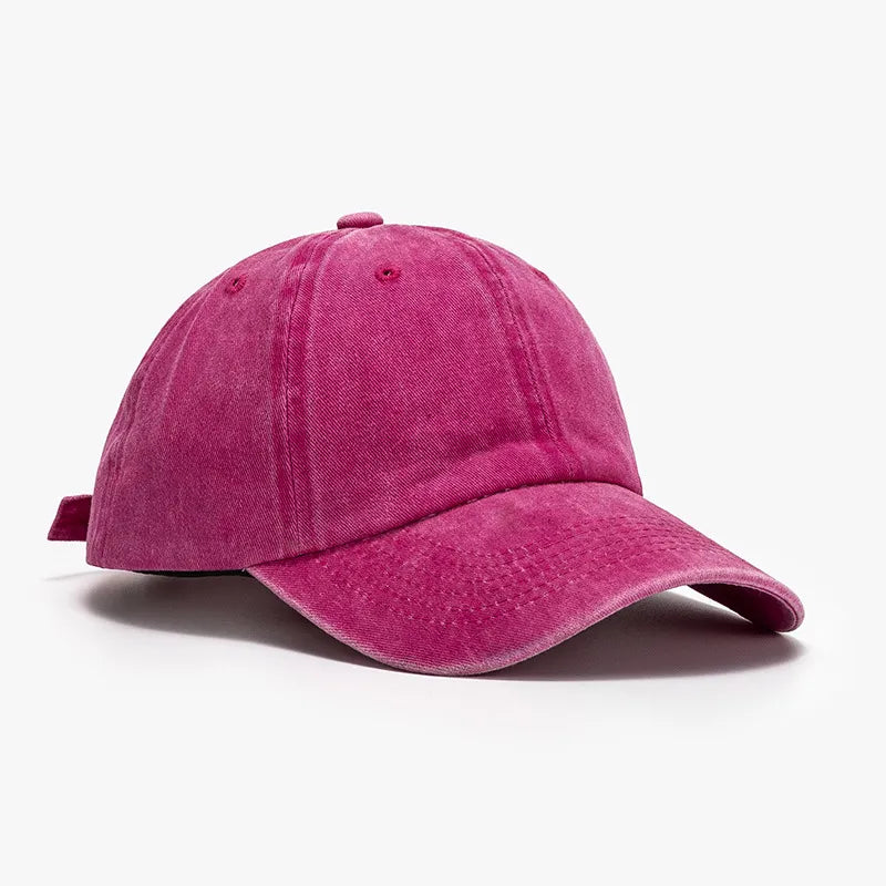 Vintage washed cotton baseball cap in cerise with adjustable strap