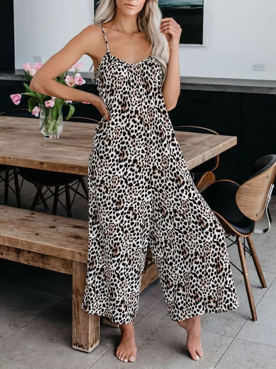Leopard print wide leg jumpsuit with spaghetti straps and a V-neck.