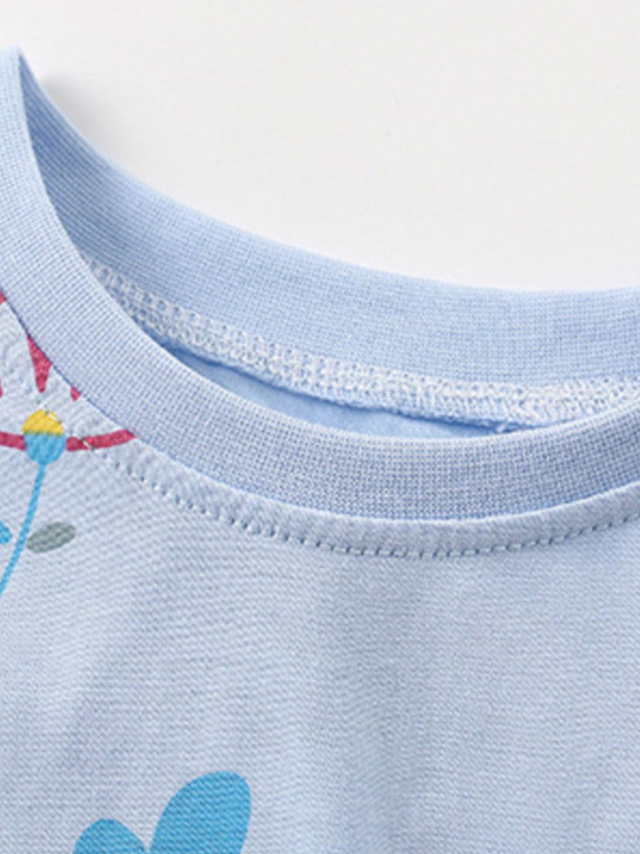 Light blue cotton toddler tee with floral print and crew neck.