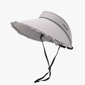Gray ruffled visor with adjustable drawcord and wide brim