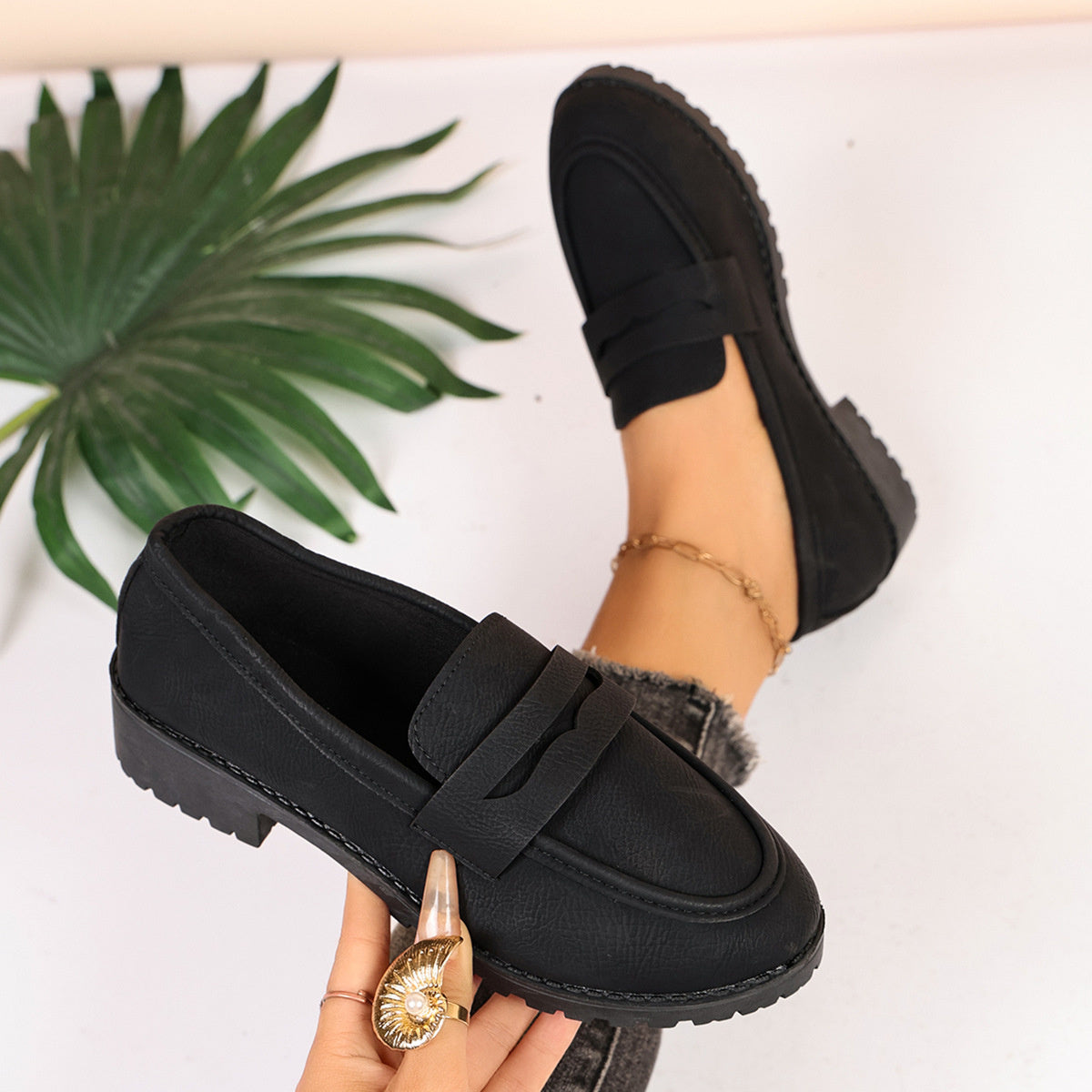 loafers in black featuring penny loafer strap and regular fit