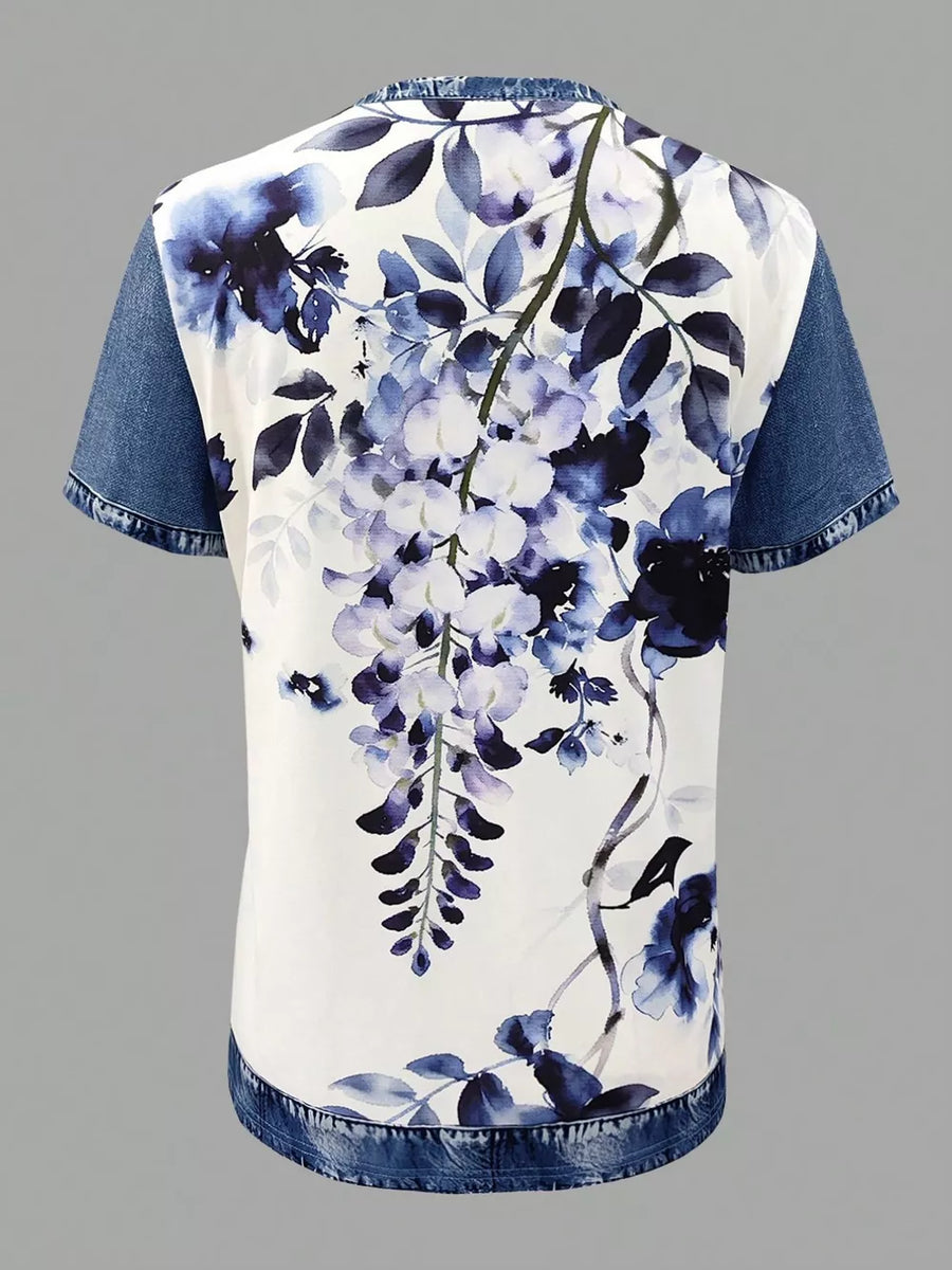 Denim patchwork shirt with blue floral print, short sleeves, and a casual fit.