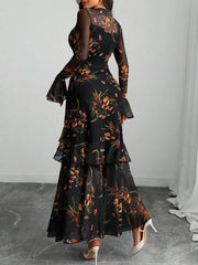 Black floral maxi dress with sheer flounce sleeves and tiered skirt