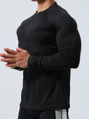 Black performance raglan zip-neck long sleeve active top