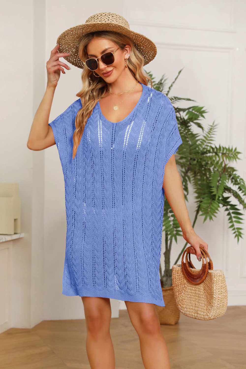 Blue open-knit beach cover-up dress with V-neck and short sleeves.