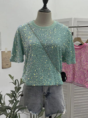 Mint green crew neck t-shirt with iridescent sequin embellishments and short sleeves.