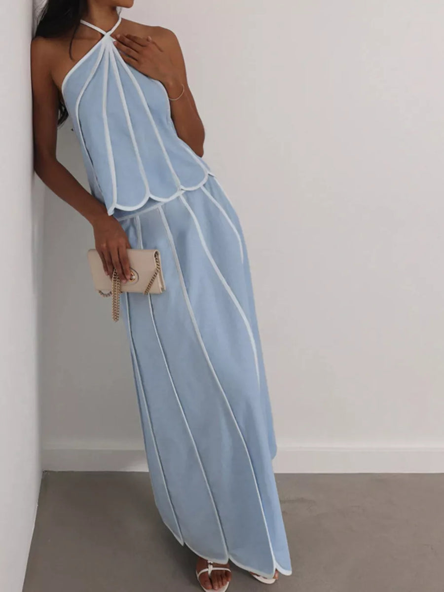 Light blue halter neck maxi dress with white piping and scalloped hem.