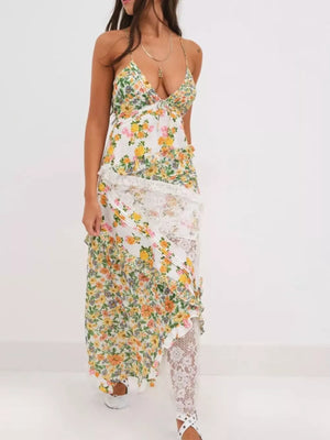 Floral lace maxi dress with ruffles and a plunging neckline.