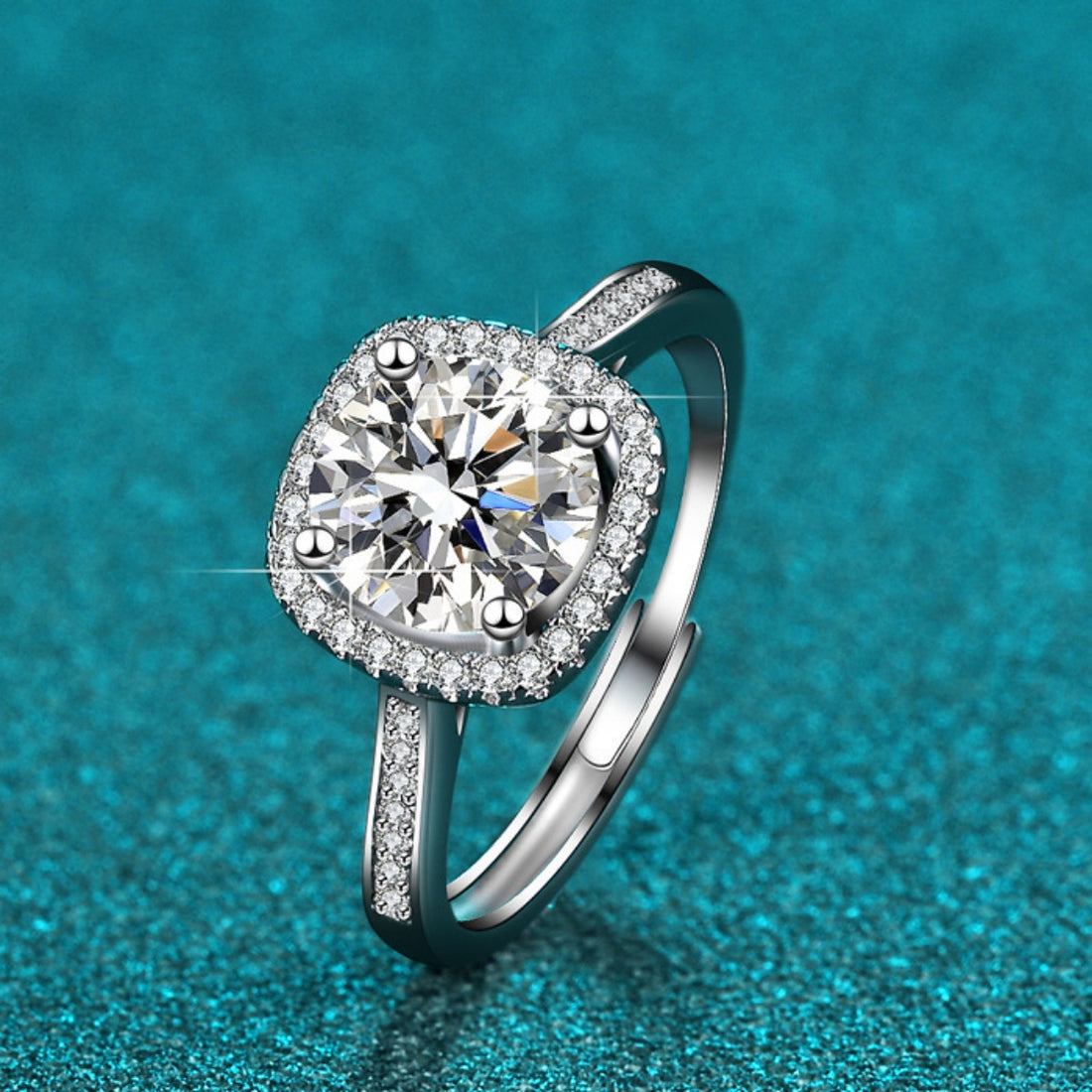 ring in silver featuring halo setting and fitted fit
