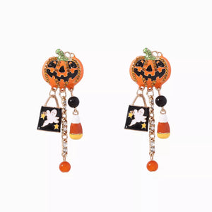 earrings in orange with graphic and dangle