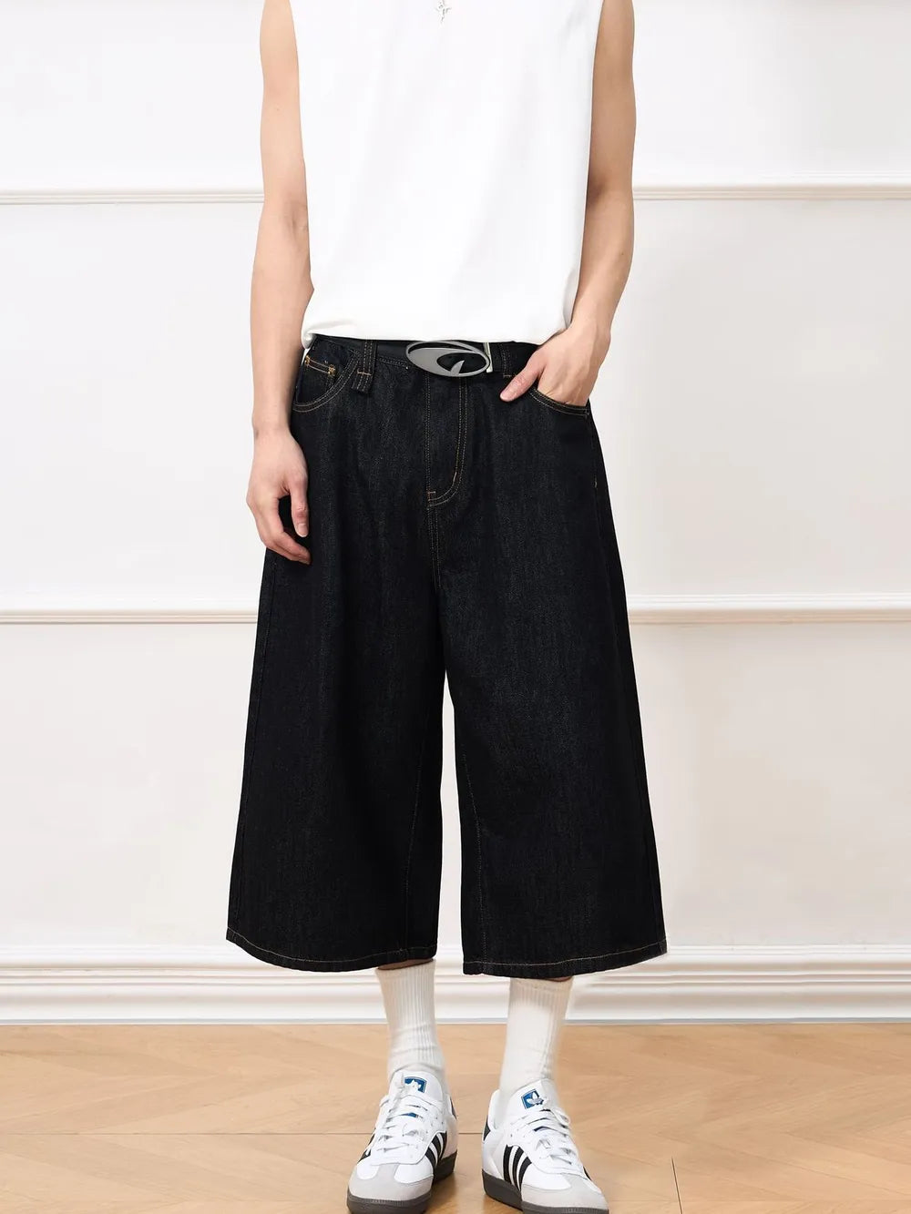 Men's relaxed fit black denim culotte shorts made of cotton.