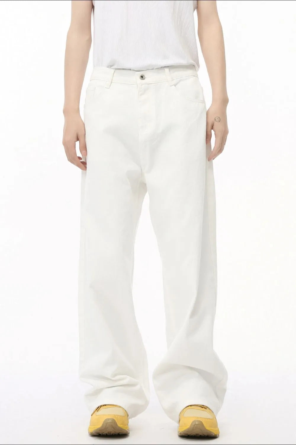 White denim wide-leg trousers with elastic waist and button fly